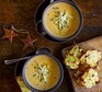 Cider & onion soup with cheese & apple toasts served in two bowls