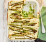 Asparagus & broad bean lasagne served in a casserole dish