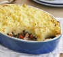 Vegetarian cottage pie with slice taken out