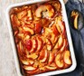 Salted caramel & apple pudding in a large baking dish