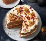 Spiced walnut cake with a slice cut out